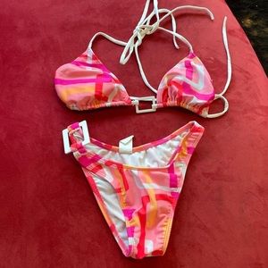 Vintage two piece marked a medium best fits a size small